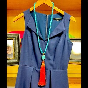 Beautiful turquoise and rust tassel necklace